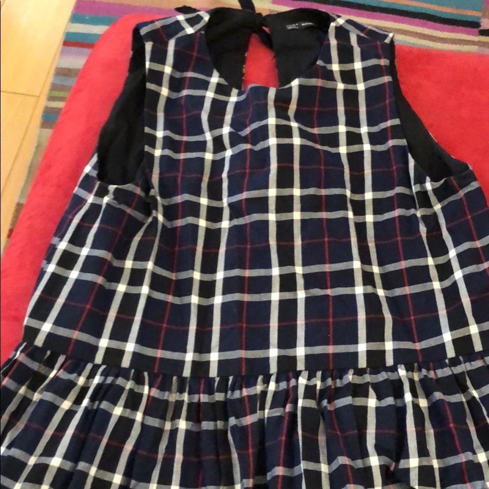 Peplum shirt with bow detail